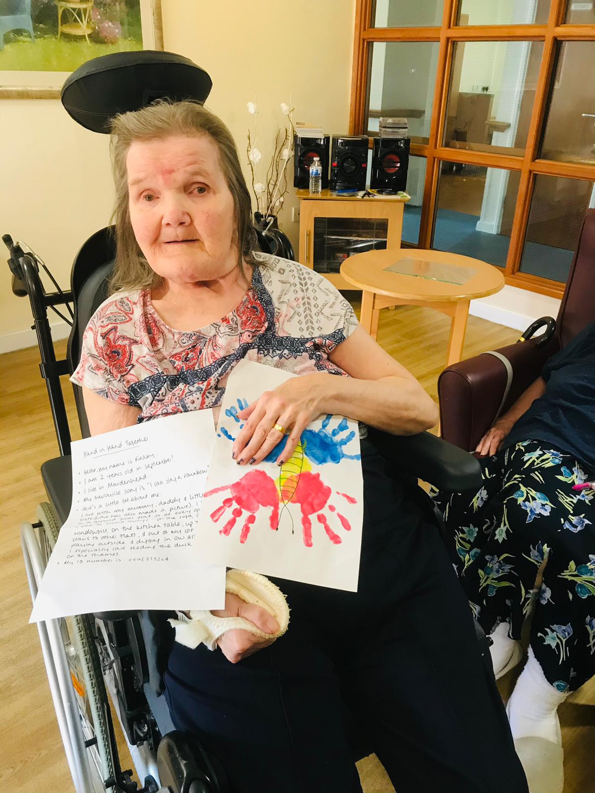 Care home resident with picture