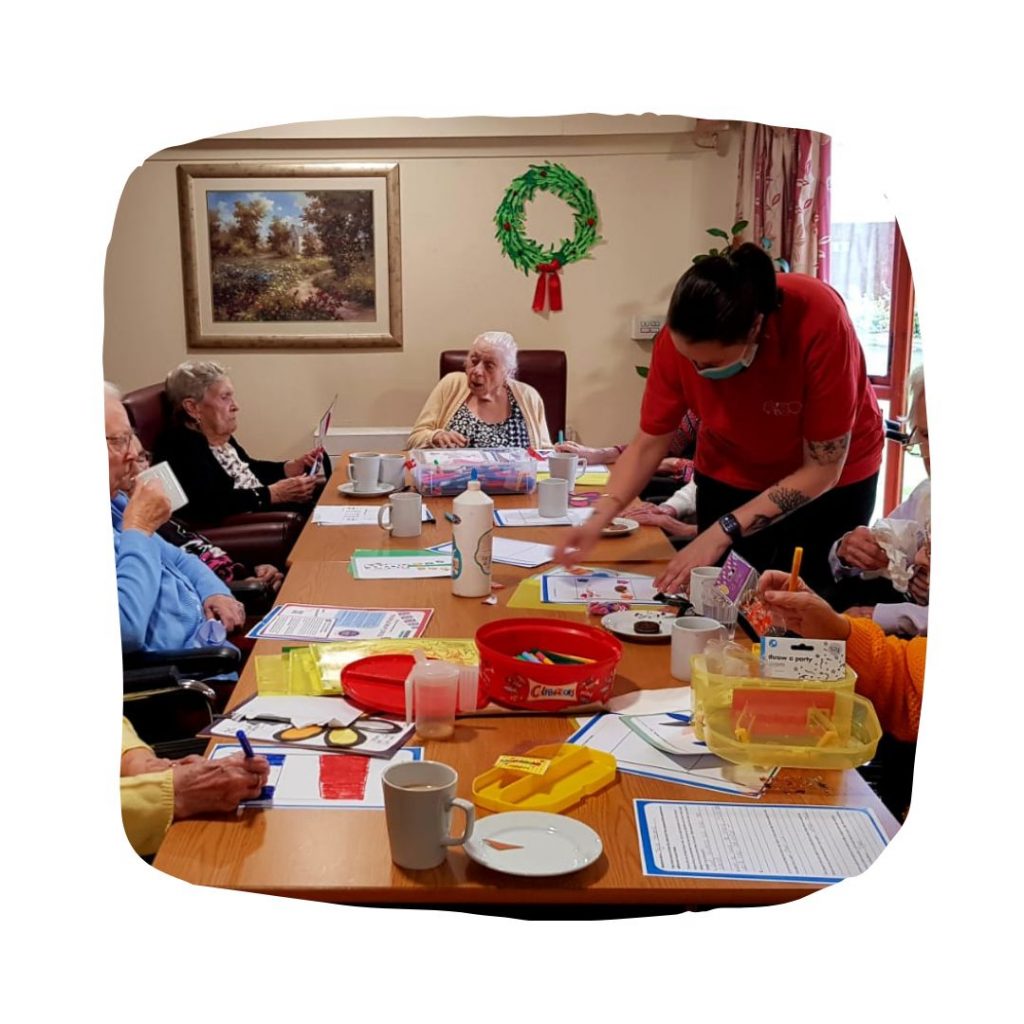 Residents at care home enjoying Crafting Connections as a group activity